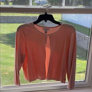 Pink/peach Calvin Klein sweater with gold clasp